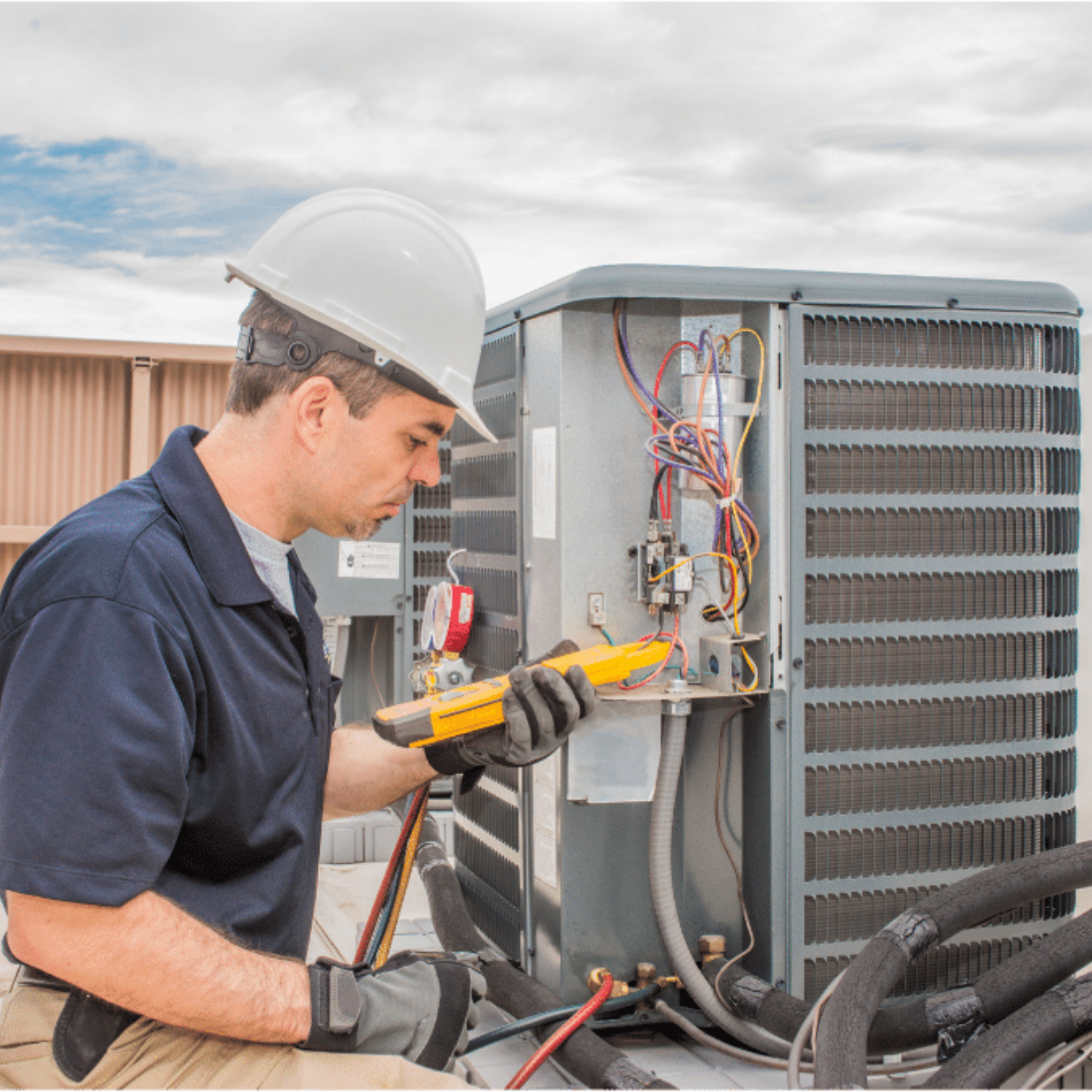 Glencoe Heating & Cooling HVAC technician on a service call in Glencoe, Ontario